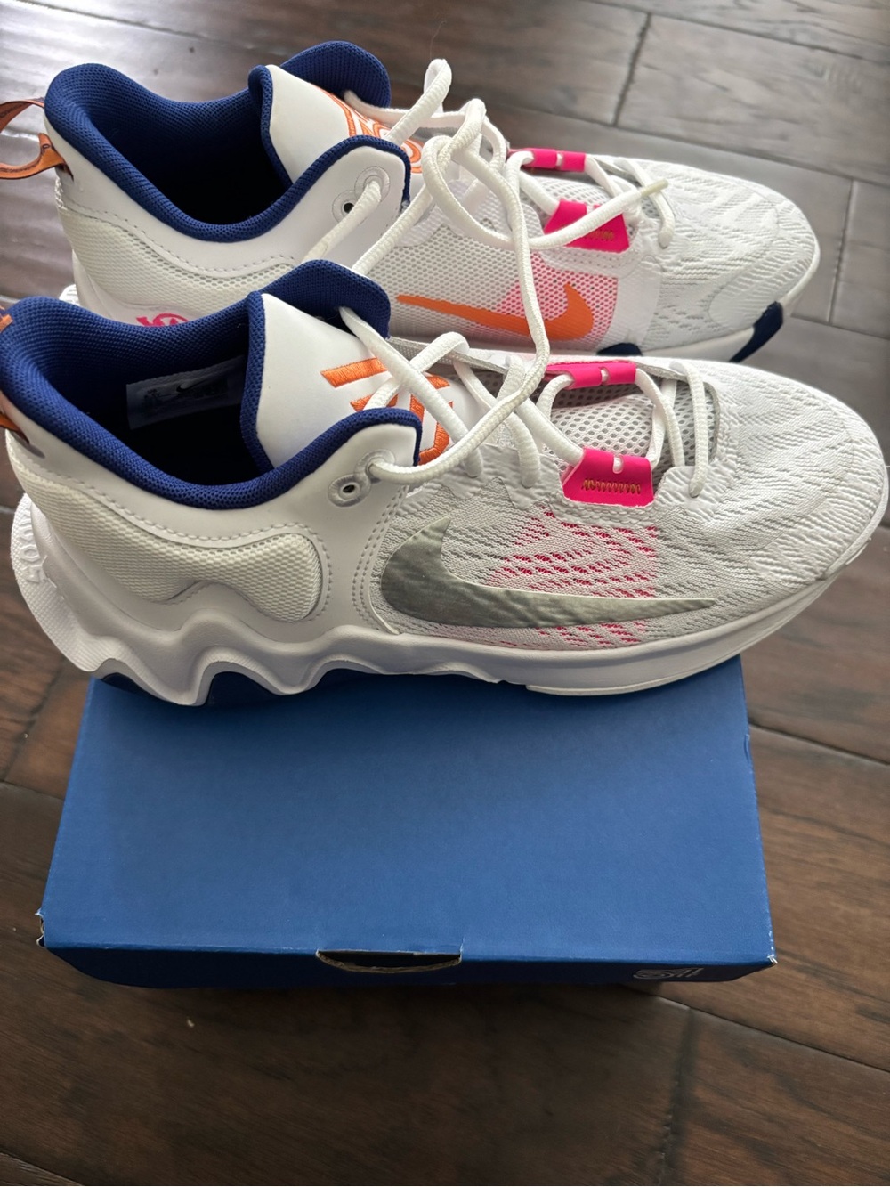 Nike Kids White Sneakers with Pink, Orange & Navy Accents